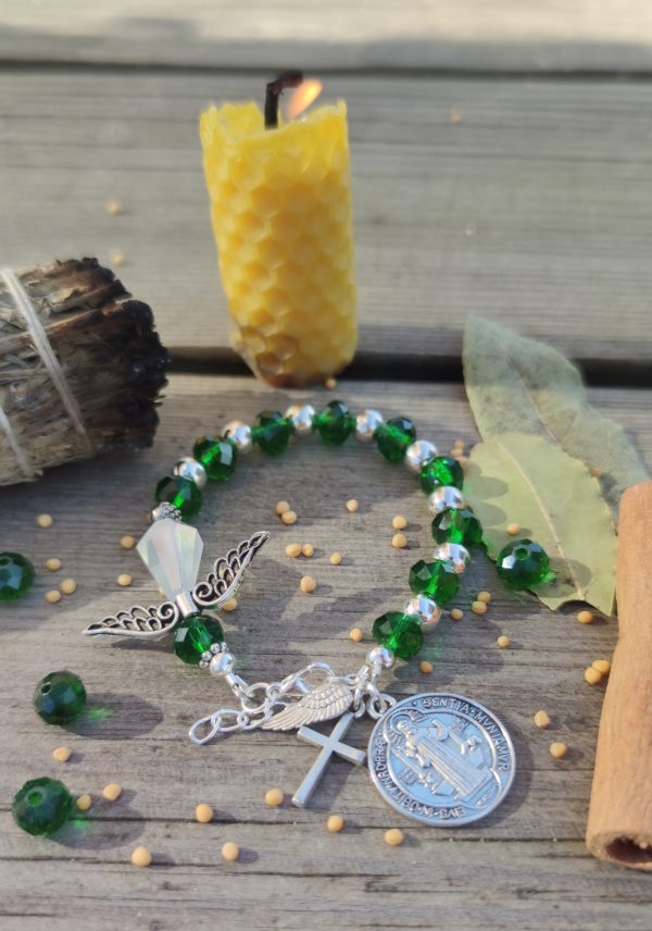 Rožančius ant automobilio vairo, rankinės, piniginės. Simbolizuoja harmoniją ir gausą